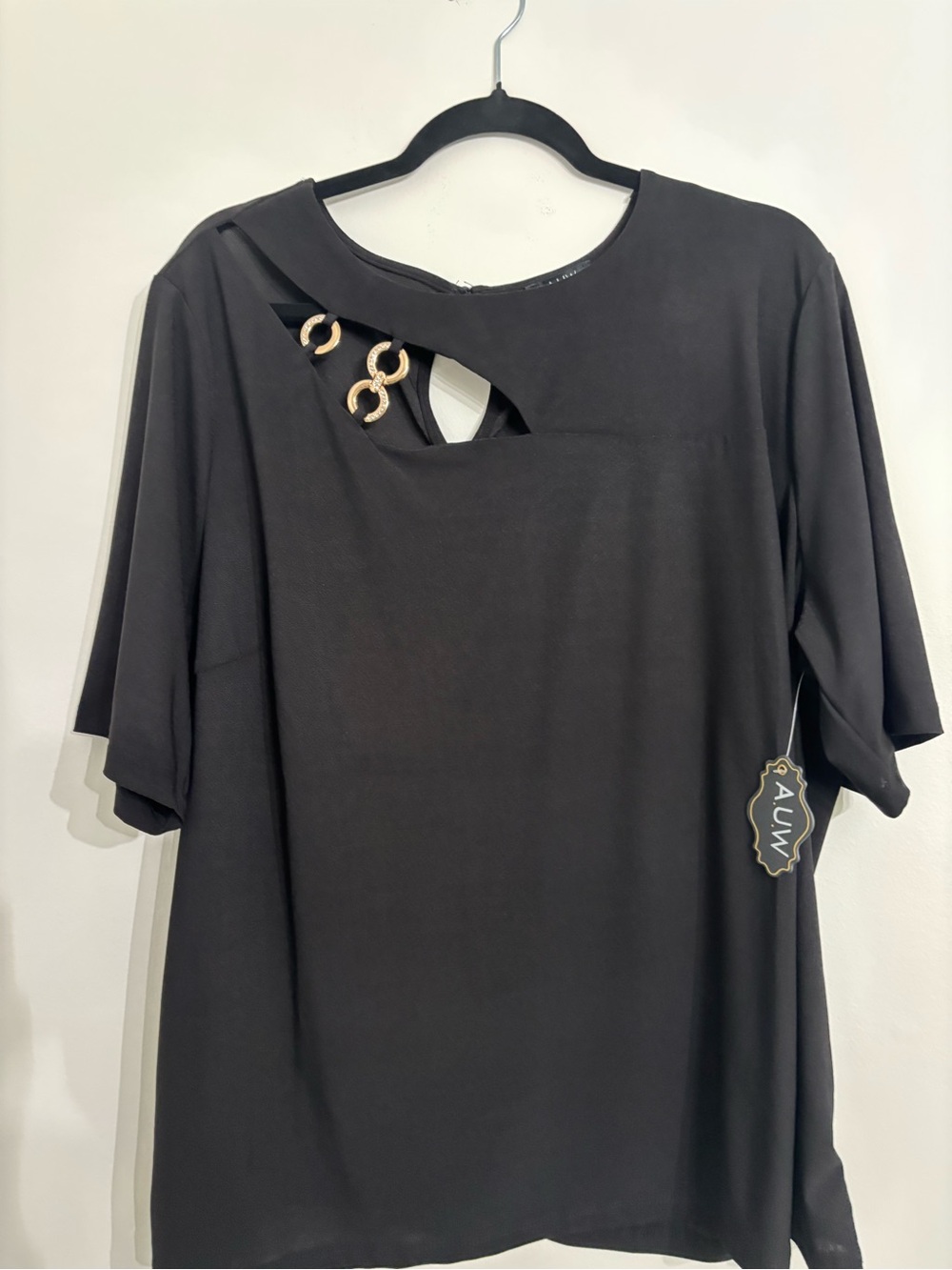 Black Short-Sleeve Top with Decorative Rings